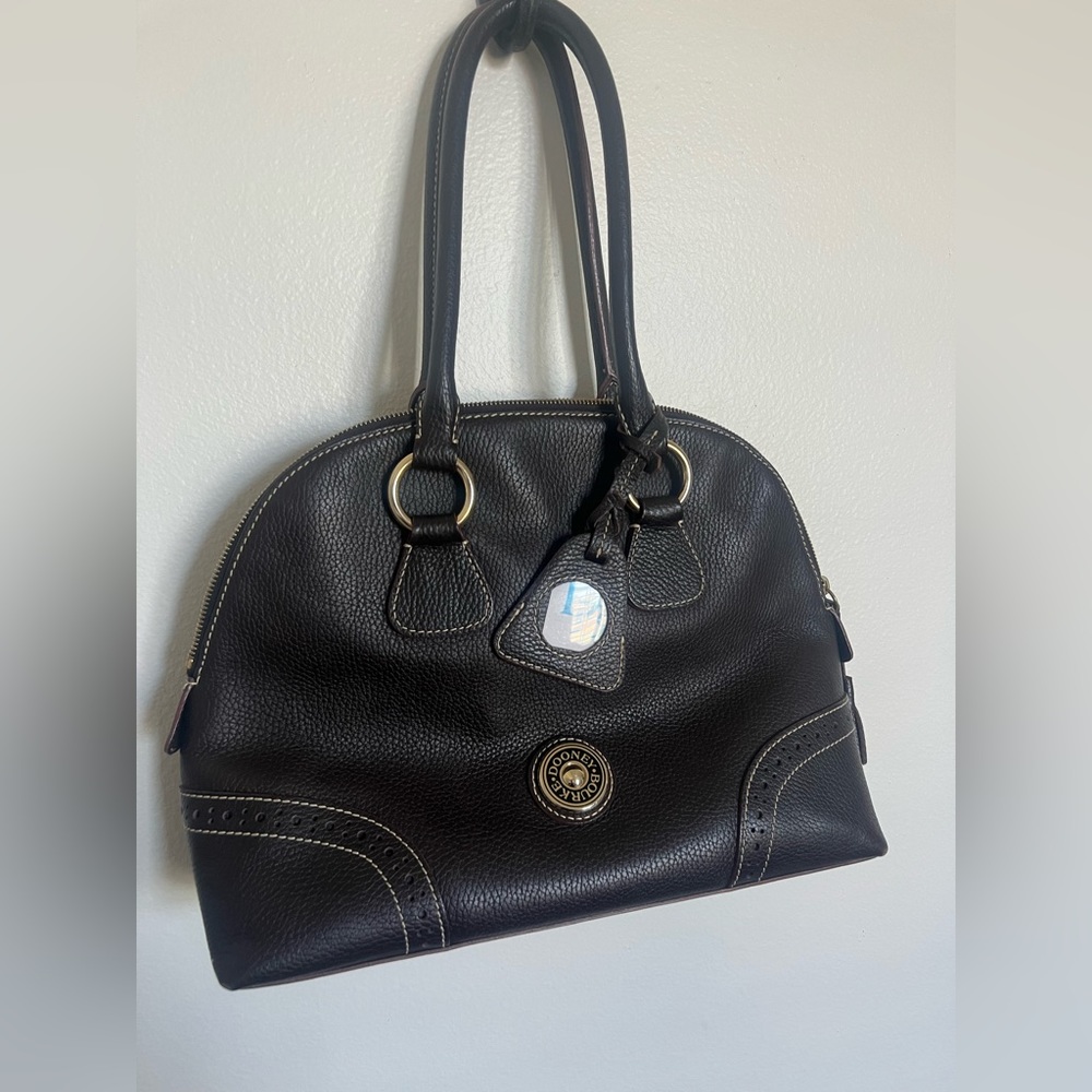 Dooney & Bourke pebble grain large domed leather purse